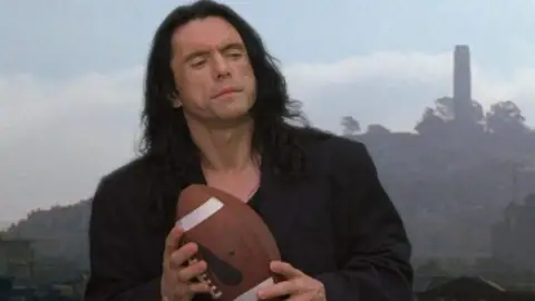 Where Did Eccentric Hollywood Icon Tommy Wiseau Get His Money? A Deeper Look at the Dubious Career of “The Room” Director